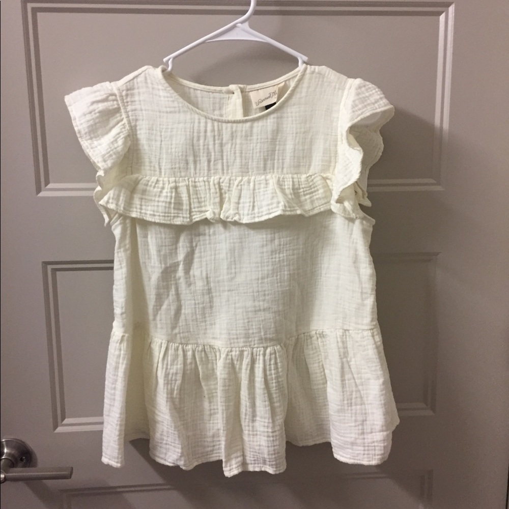 Adorable cream colored ruffle sleeve top